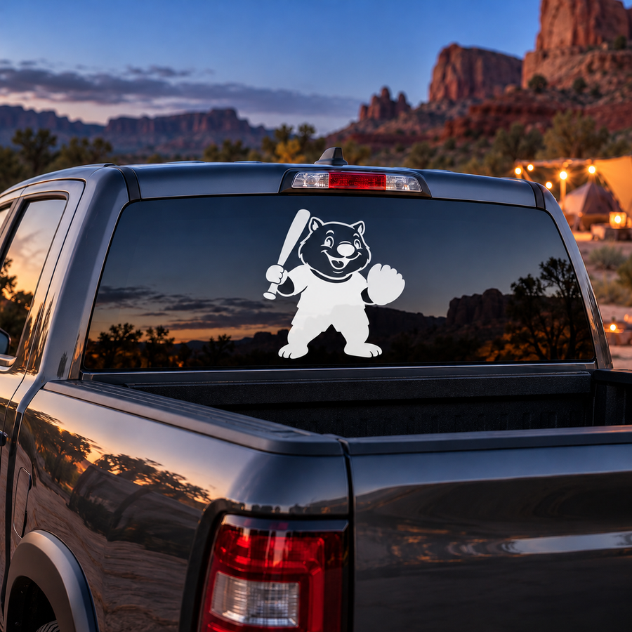 Car rear window vinyl decal of a cartoon wombat holding a softball bat
