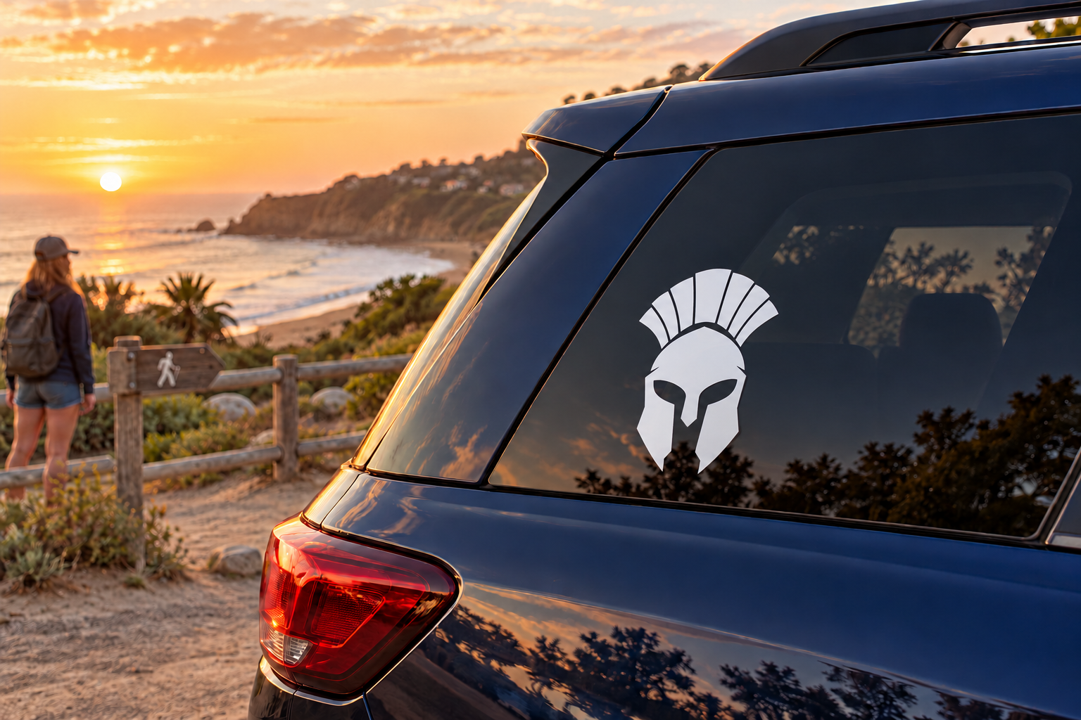 Spartan helmet front vinyl decal, black and white crest on rear window