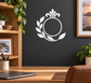 White laurel wreath vinyl decal with circular center and shield-style emblem