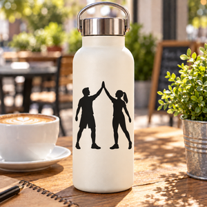 Vinyl decal of two sports fans high-fiving, black silhouettes on white surface