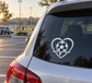 Soccer heart beat vinyl decal of a soccer ball in a heart, on car rear window