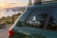 Soccer athlete pulse vinyl decal on car rear window: runner silhouette with heartbeat line.