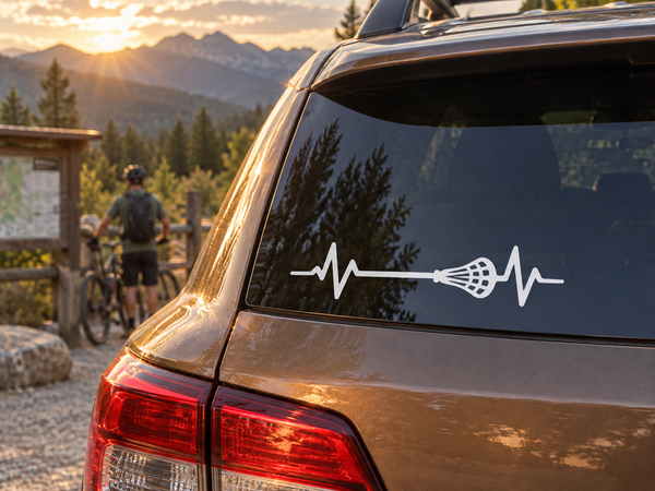 Vinyl lacrosse pulse line decal on car rear window, white heartbeat and net graphic