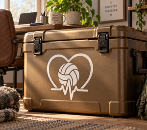 White vinyl heart decal with volleyball icon and heartbeat line on a case