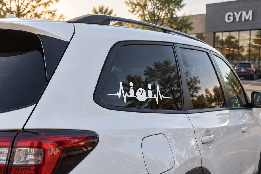 Bowling pulse line vinyl decal on car window, black bowling ball and pins graphic.