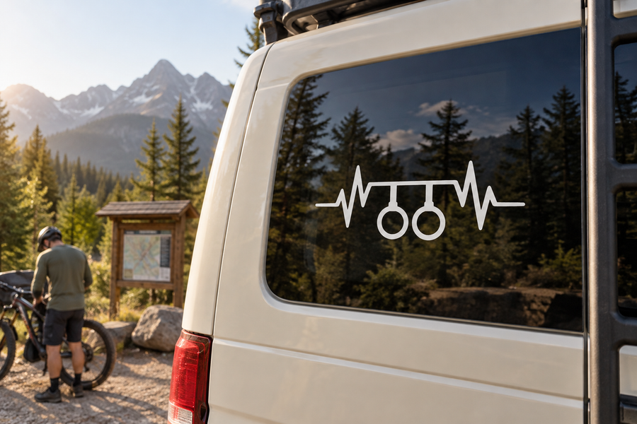 Vinyl pulse line decal with heart-beat waveform and goggles icon on car window