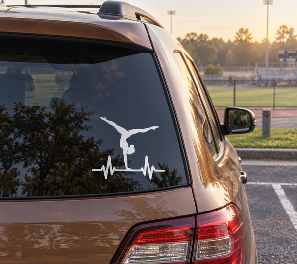 Gymnastics pulse vinyl decal with gymnast silhouette and heartbeat line on car window