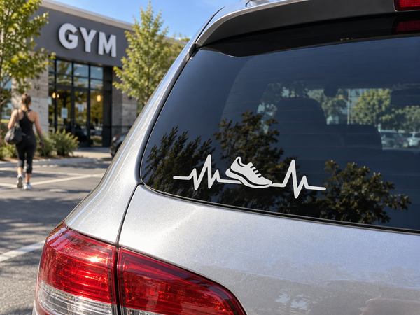 Running pulse line vinyl decal with running shoe icon on car rear window, black