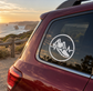 Circular vinyl decal with black running shoe and heartbeat waveform inside a white badge