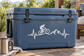 White mountain biking pulse line vinyl decal with rider silhouette, bike, mountains, waveform