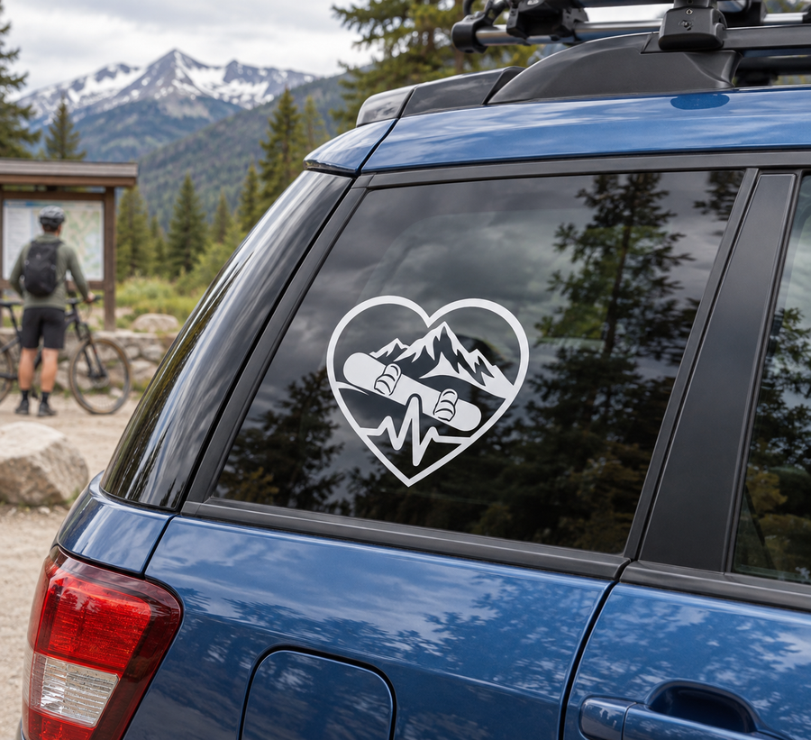 Snowboarding heart-beat vinyl decal: white heart with black snowboarder, mountains, heartbeat line
