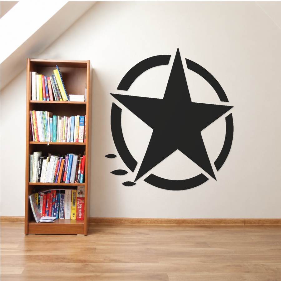 Black five-point star wall art with broken circular ring and three leaf accents.