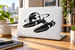 Black starship vinyl decal sticker with globe, on white backing