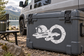 White starship and circular star gate vinyl decal on a dark cooler