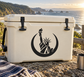 Vinyl decal of Liberty Statue within a crescent moon on a white cooler