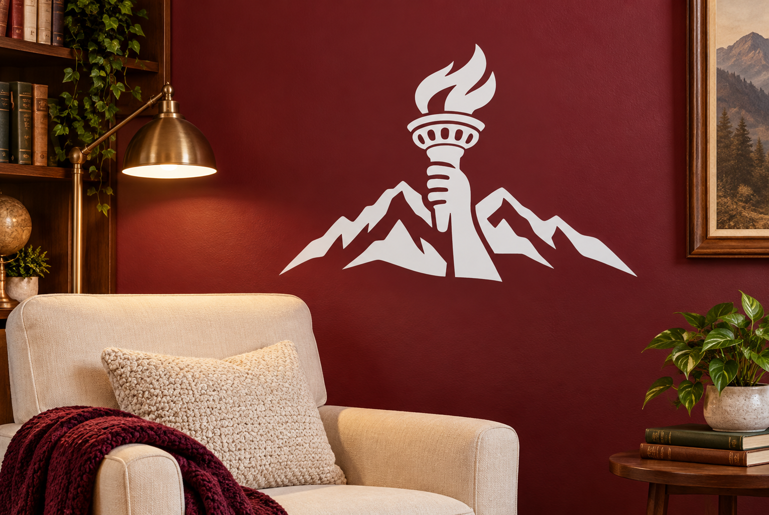Vinyl wall decal of torch, flame, and mountain range in white on a wall
