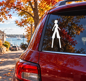 White vinyl decal of bowler-hat woman silhouette on car window