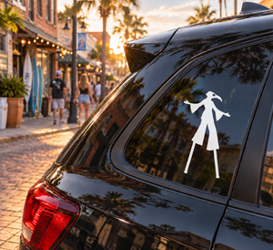 White bird-mask girl vinyl decal on dark car window, tall day design