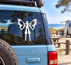 Vinyl decal of white butterfly-winged fairy silhouette on a vehicle window