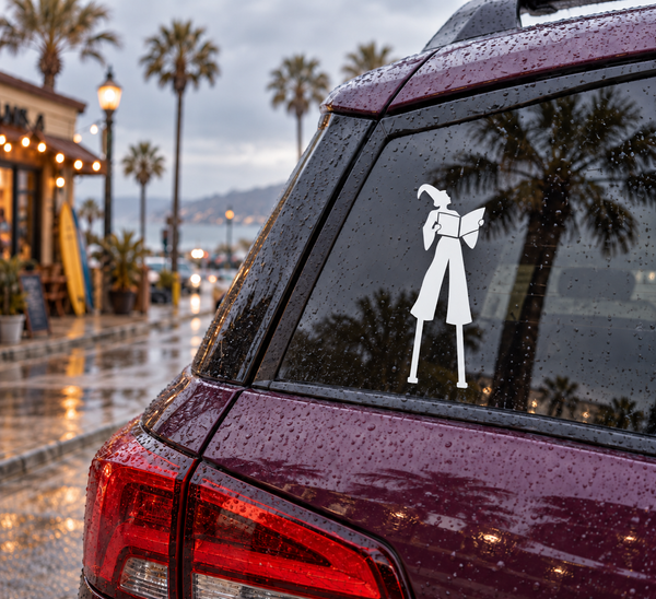 Bookish parade day vinyl decal: white silhouette figure holding a book on a car window.