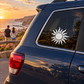 Radiant wavy sun vinyl decal with open circular halo on car window