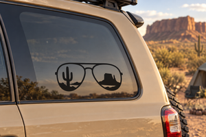 Vinyl sunglasses decal with cactus and desert silhouettes on car window