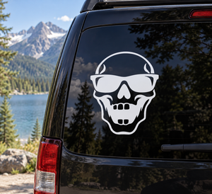 Skull sunglasses vinyl decal in white on car body, side view