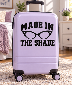 Vinyl decal: sunglasses graphic with 'MADE IN THE SHADE' text.