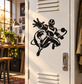 Black superhero vinyl decal of masked runner carrying a globe on a door panel