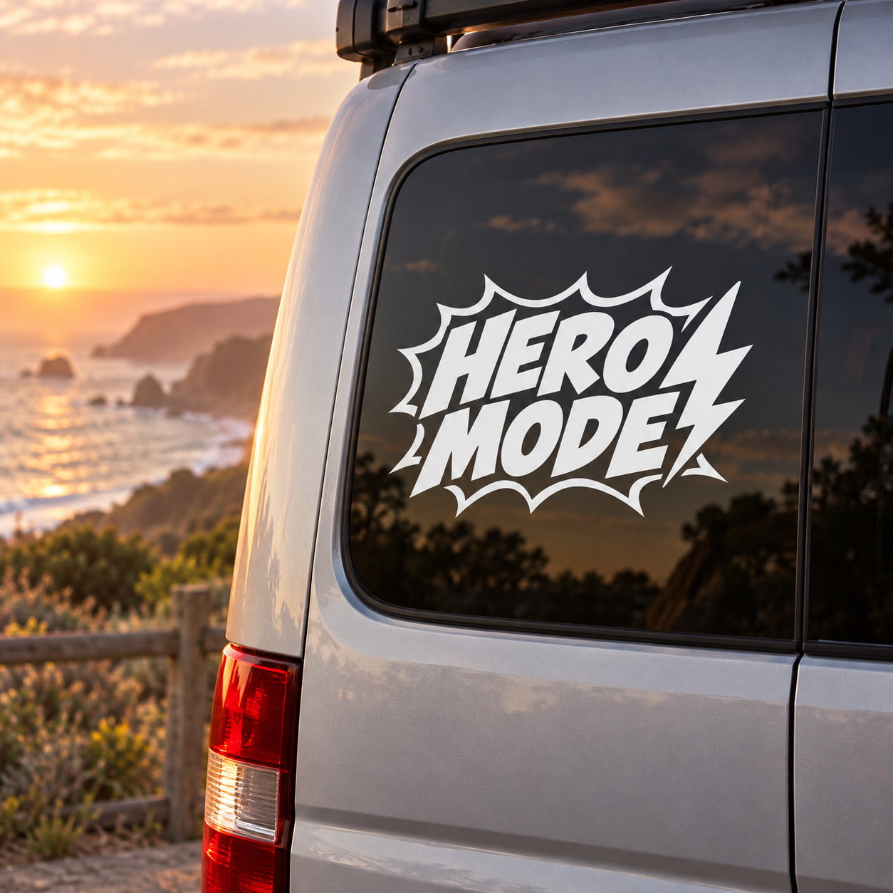 Hero Mode vinyl decal on a vehicle rear window, comic bold text with lightning