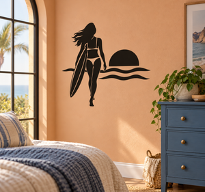 Black surfing girl vinyl decal with surfboard, sun, and wavy water lines