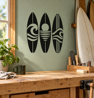 Surfboard vinyl wall decal: three black surfboards with white wave graphics
