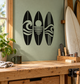 Surfboard vinyl wall decal: three black surfboards with white wave graphics