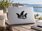 Surfing fin trio vinyl decal with black three-fin icon on a light surface