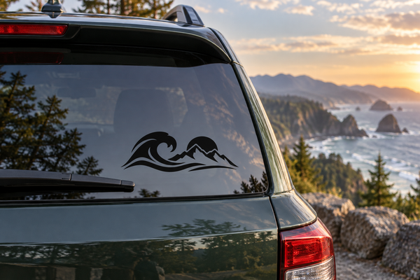 Mountain and ocean surf vinyl decal on car rear window, black wave and mountain icons