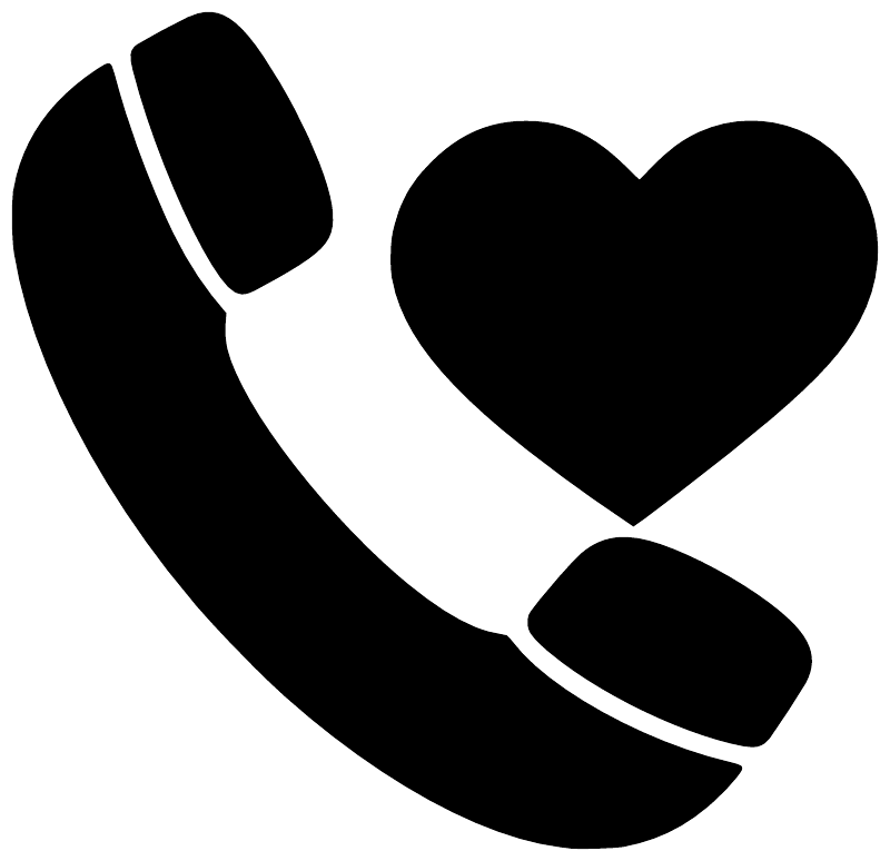 Black telephone handset and heart vinyl decal, close-up