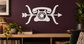 White telephone and bow vinyl wall decal, phone icon with arrow-like accents