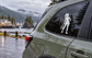 Vinyl tennis decal on car window: female silhouette holding racket at rest