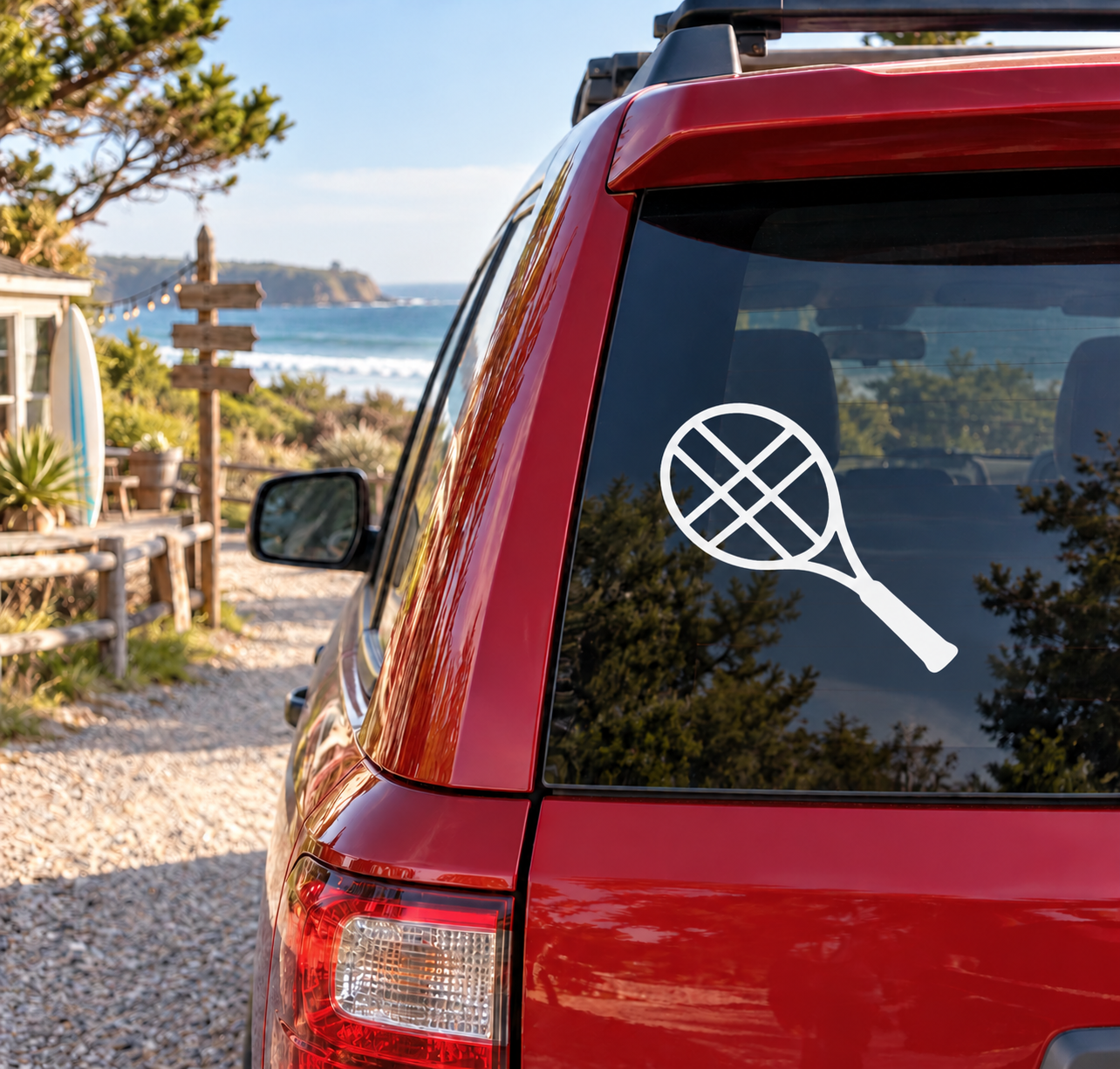 Tennis racket vinyl decal in white on a car window