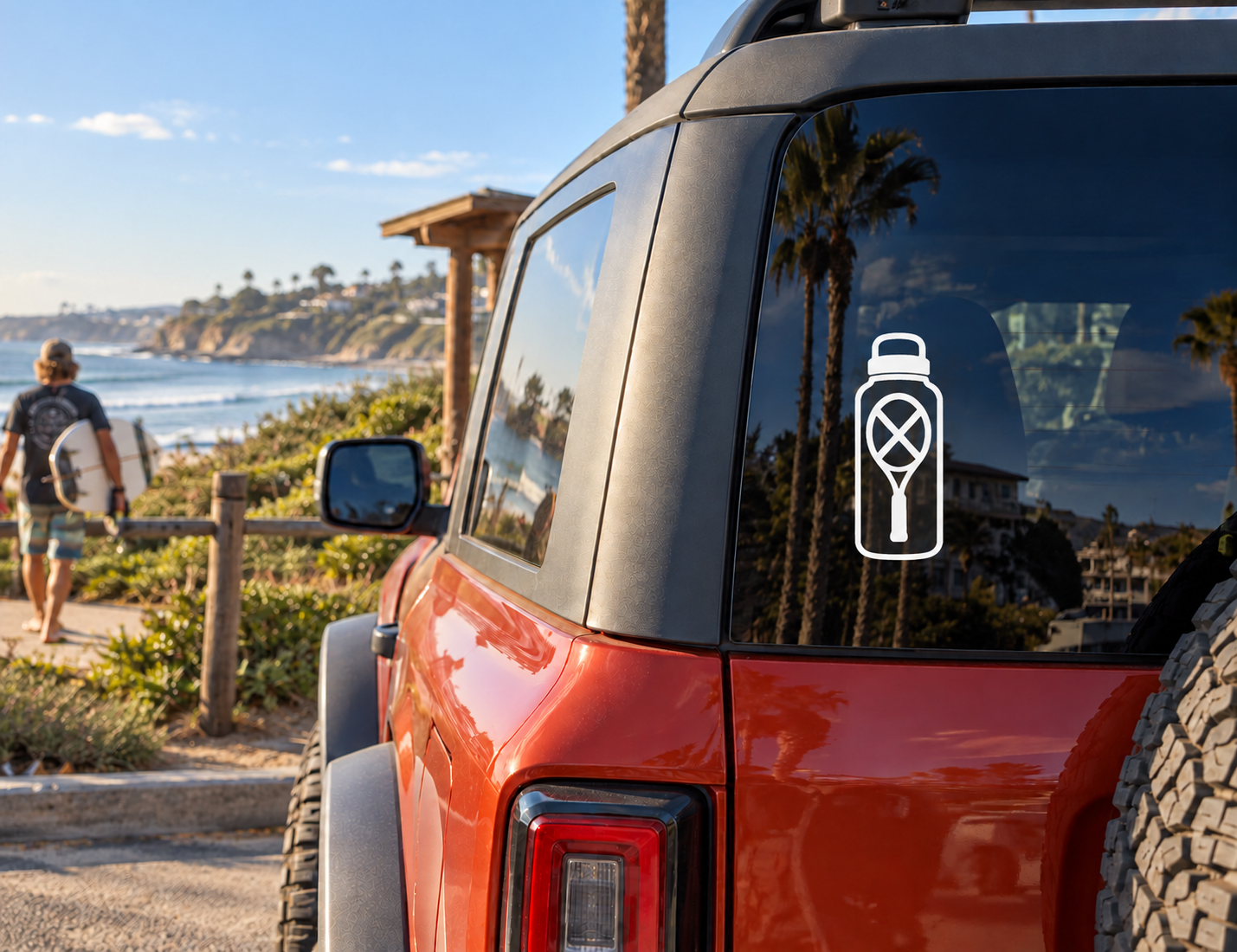 White bottle-shaped tennis courtside vinyl decal on car window