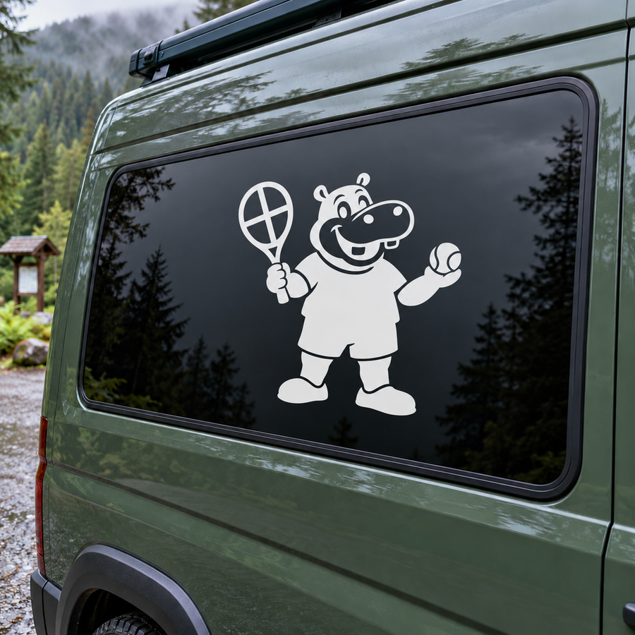 White vinyl decal of cartoon hippo holding tennis racket on car window