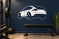 White rear-angle car vinyl decal with black wheels and outline