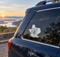 Texas ranch boots vinyl decal on car window, white outlined boots