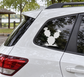 Texas prickly pear vinyl decal of three cacti with flowers on car window