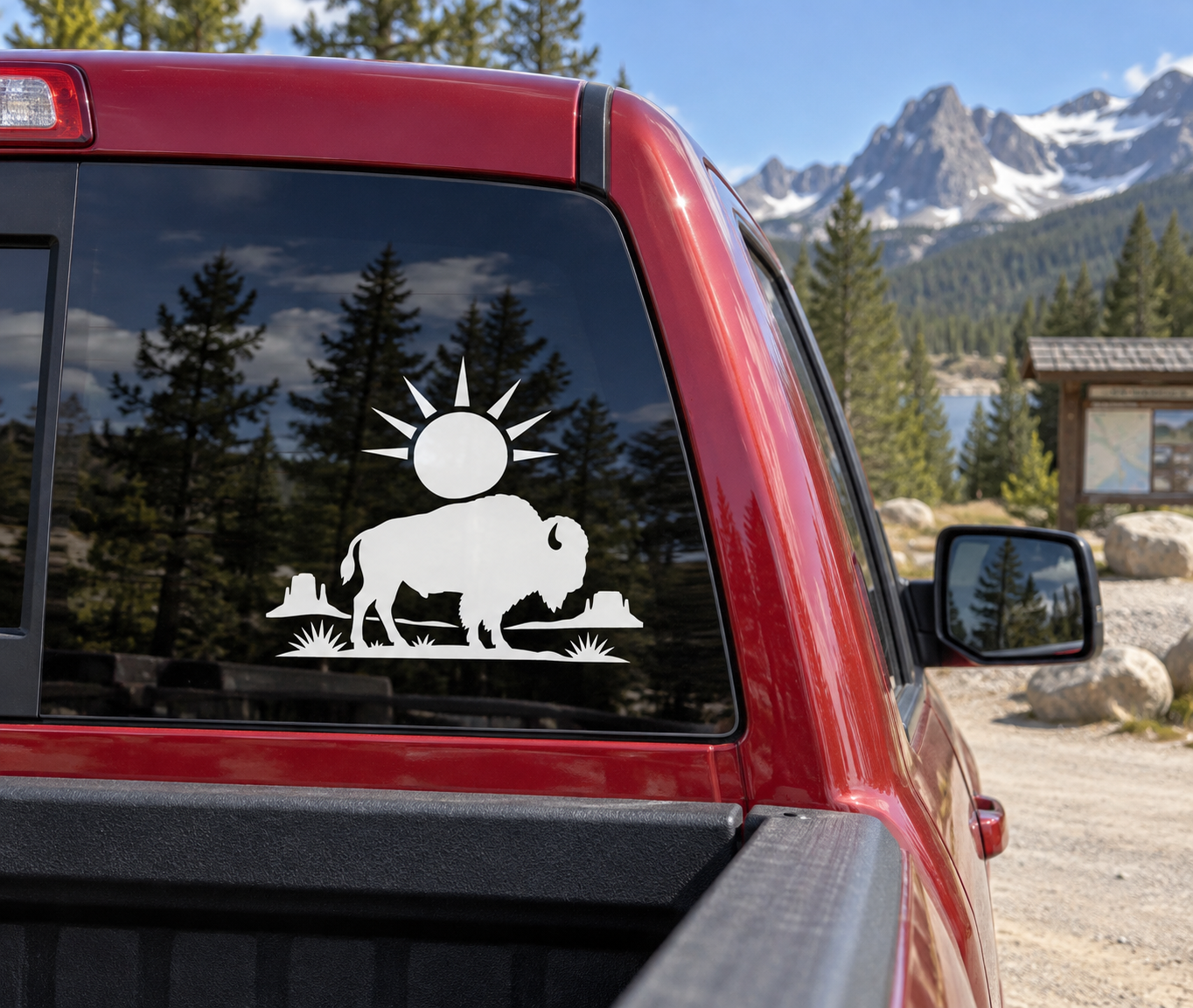 Black bison vinyl decal with prairie grass and rising sun on car window