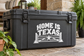 Black vinyl decal reading “HOME IS TEXAS” with Texas outline and star