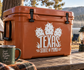 Texas state of mind vinyl decal with Texas text and cactus icons on brown cooler