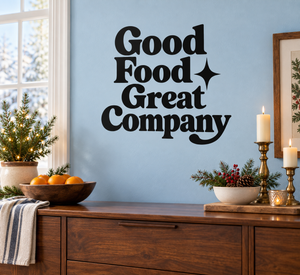 Black vinyl decal reading Good Food Great Company with star