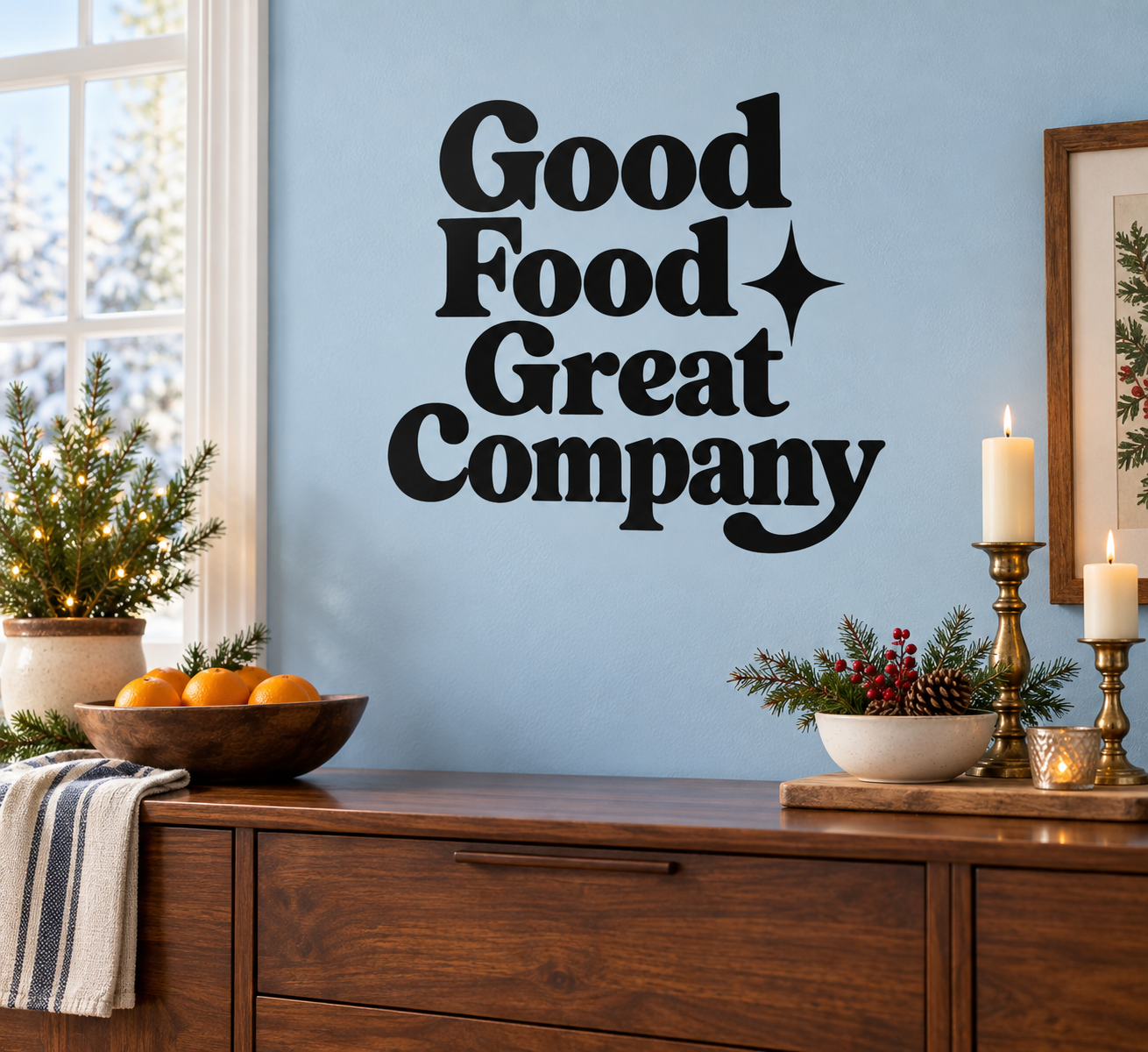 Black vinyl decal reading Good Food Great Company with star