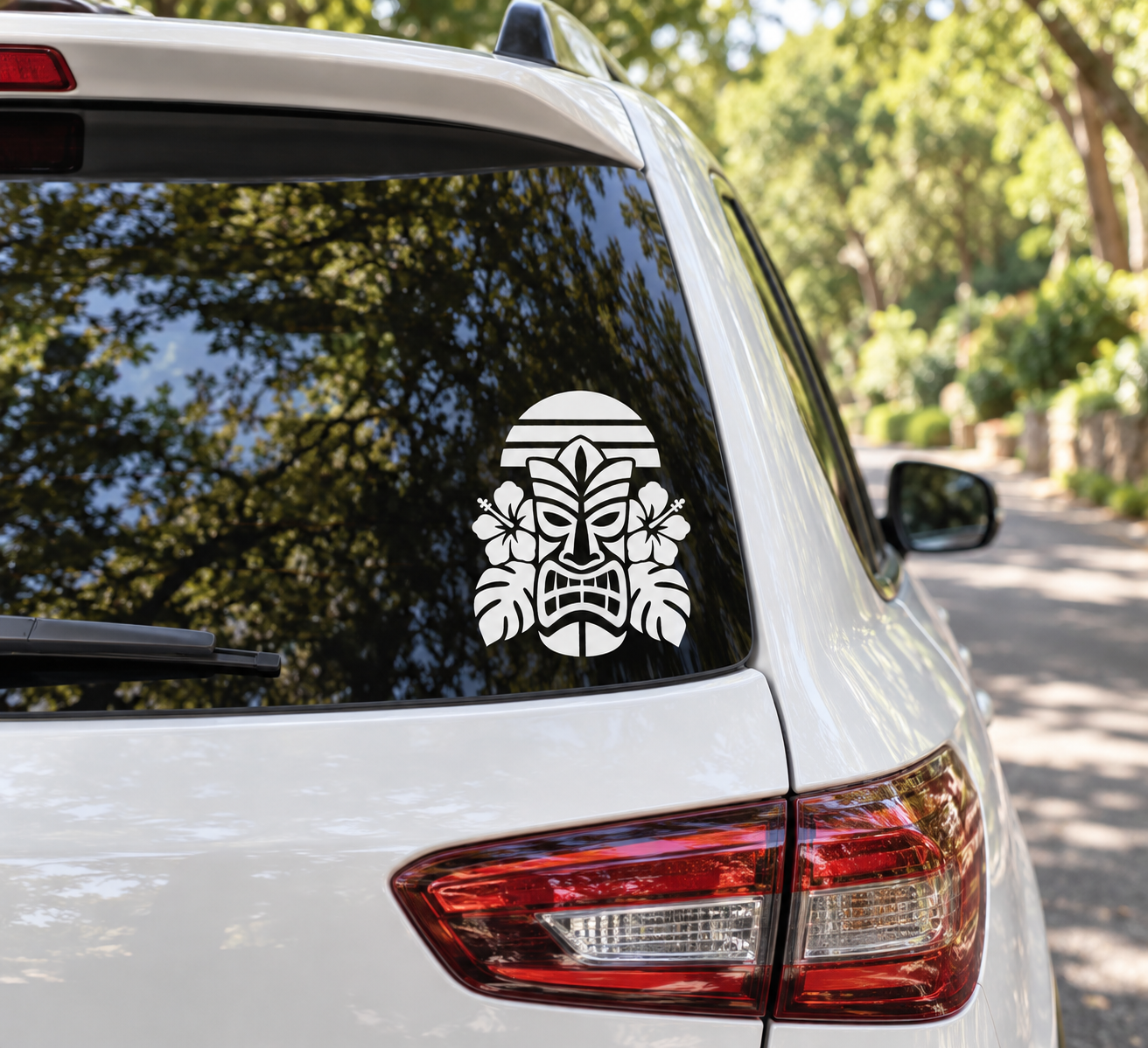 Vinyl totem decal with tiki mask design on car rear window